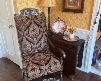 Large carved chair; dropleaf table