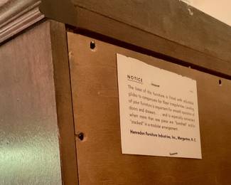 Label on back of wardrobe