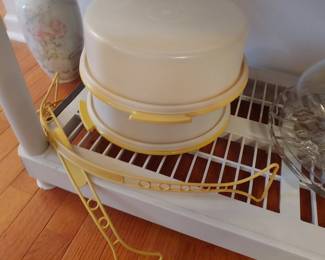 Two Tupperware pie takers with lids and handles