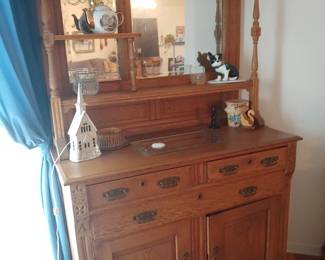 Antique oak Buffet/ Hutch with beveled mirror three drawers two doors three shells dovetail excellent condition no cracks or splits