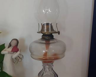 One of two vintage oil lamps