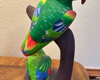 Brightly colored balsa wood parrot art