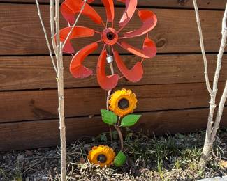 Whimsical yard decor, sun catchers, spinners, chimes