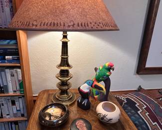 End tables, brass lamps, Central American decor