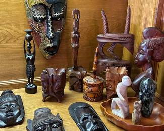 African decor pieces: masks, figurines both wood and stone