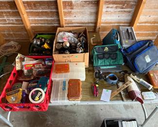 Large variety of lures, tackle boxes, reels, rods