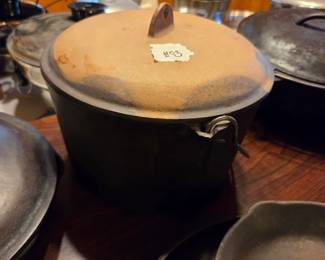 #93	Hanging Dutch oven w/handle and Lid	 $25.00 