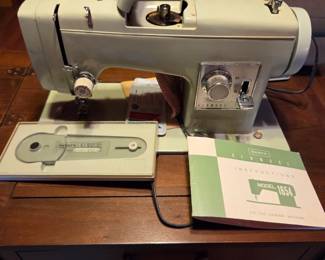 #38	Sears Kenmore Model 1654 Sewing Machine in Cabinet w/cams	 $50.00 