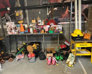 Lots of Toys esp legos, trucks, Darts, Plastic Hatchets, Stanley Tool Bench Rollar Blades and Skates