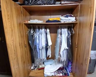 wardrobe cabinet is free for removal and clothes inside as marked or $2 each.