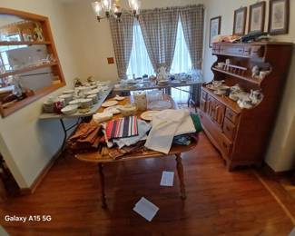 walnut dining room set, sold by the piece. Table $100, Hutch $175, 4 Chairs sold as sets of 2/ $40/set