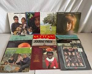 Vintage Collection of Iconic Vinyl Records Featuring Classic Artists and Bands
