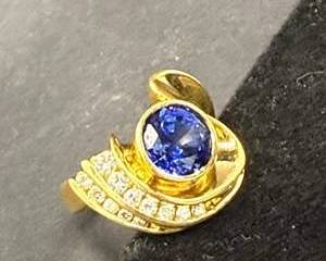 Elegant 18K Gold Ring with Oval Blue Synthetic stone and Real Diamond Accents, 10 Grams