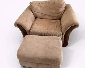 Beige Suede Armchair with Matching Ottoman and Wooden Accents