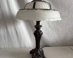 Ornate Table Lamp with Intricate Metal Base and Frosted Glass Shade