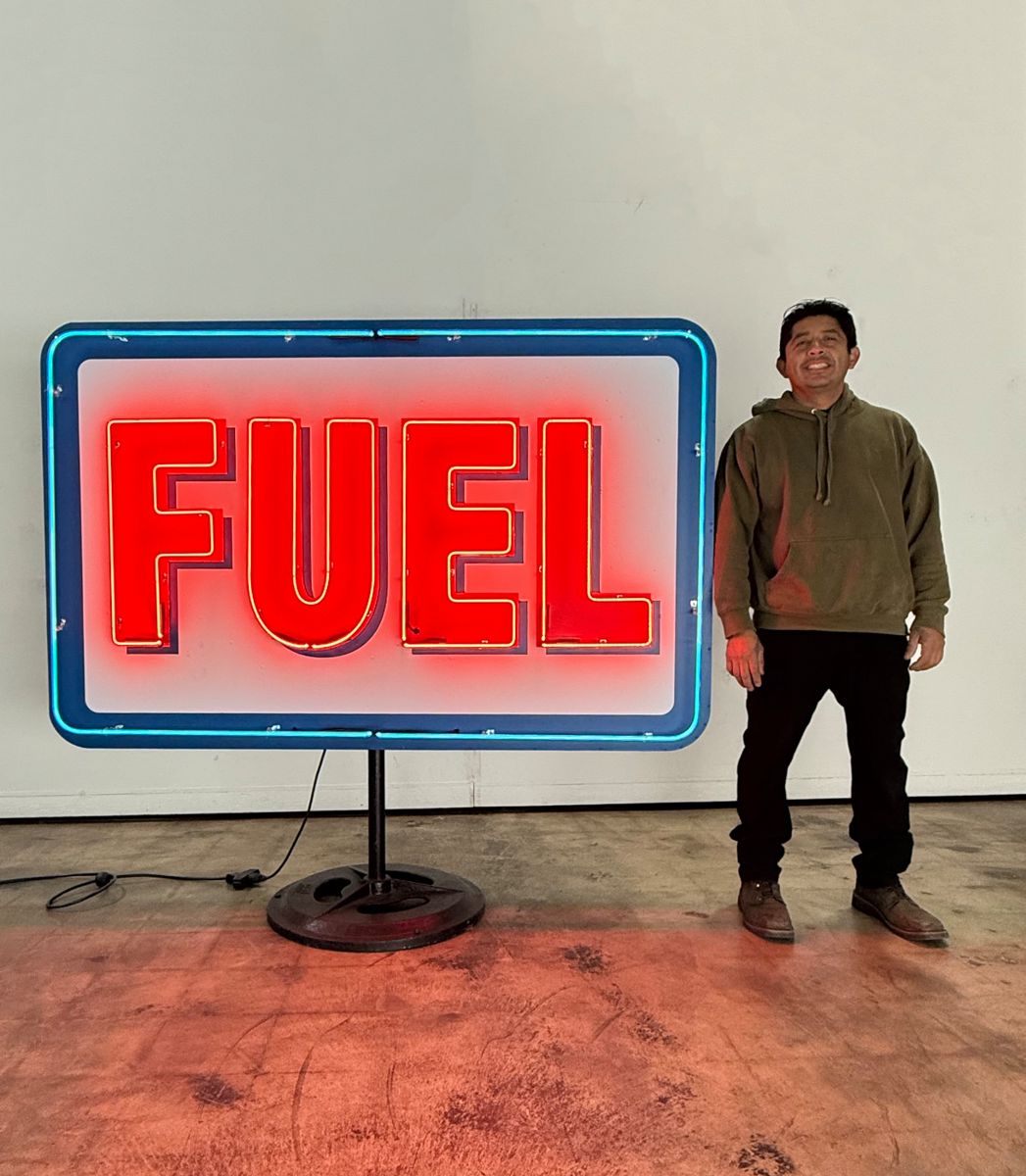 Neon sign on metal cabinet