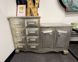 Metal leafed cabinet