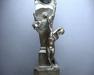 Antique bronze figure of the Classical Greek god, Pan being mourned by the shepherd, Daphnis