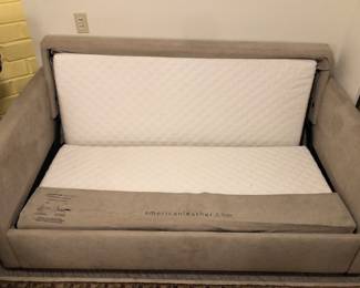 Sleeper sofa upholstery is soft fabric - with queen mattress inside