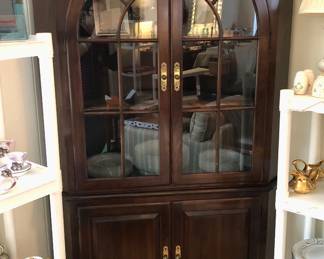Corner china cabinet with arched upper doors (76" high, 45" across front)