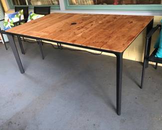 Gloster Carver dining table - metal frame with teak top (39” x 76”)