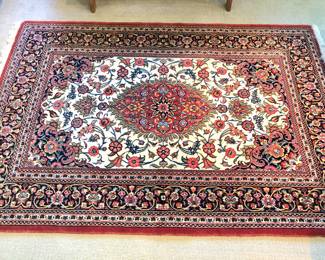 Hand woven Oriental wool rug (53" x79")