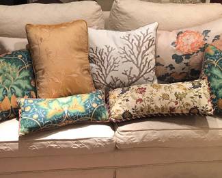 Throw pillows, some with feather inserts