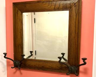 Antique oak mirror with cast iron hooks (20” square)