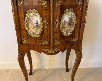 Diminutive French ormolu and porcelain mounted hutch