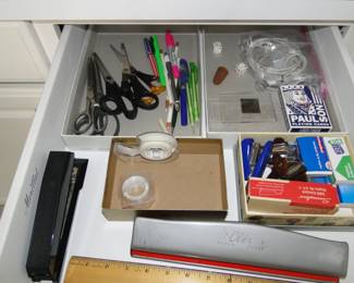 A small assortment of office supplies, and other great junk drawer finds