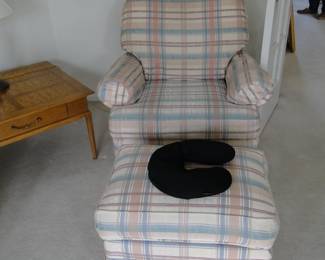 Nice comfortable chair with matching ottoman.  No cover required