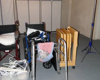 Walkers and TV trays on a mobile TV tray rack