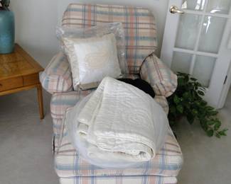 Plaid overstuffed chair and matching ottoman