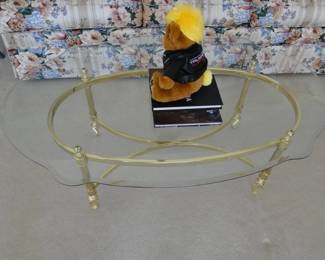 Glass and brass coffee table
