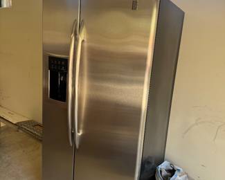 GE profile refrigerator works but needs a new panel priced accordingly