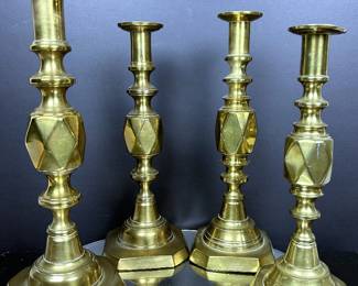Antique English brass candlesticks, the Diamond series, which were introduced in 1897 for the Diamond Jubilee of Queen Victoria. King of Diamond, Queen of Diamond, Diamond Prince and Diamond Princess.