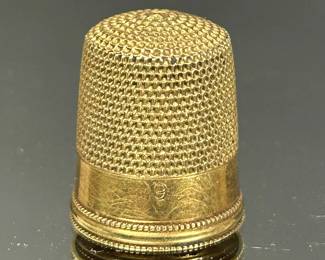Antique gold sewing thimble