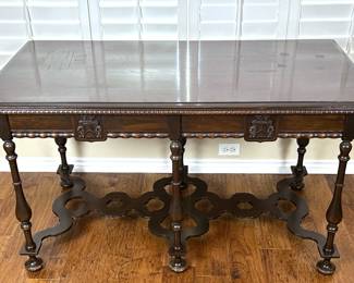 An antique 1920s William & Mary style library table by Imperial of Grand Rapids, Michigan