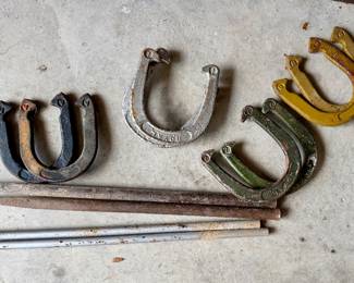TWO SETS OF CAST-IRON HORSE SHOES