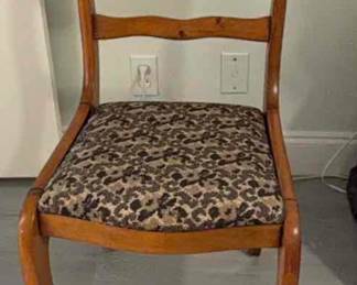 Vintage wood carved chair with padded seat