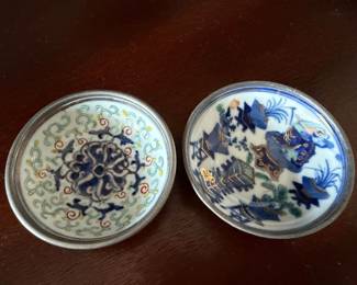 Ceramic oriental dishes in pewter