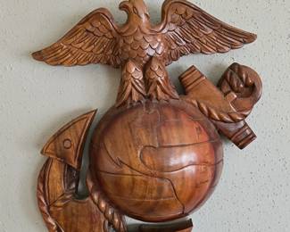 Wooden plaque featuring the official emblem of the United States Marine Corp USMC