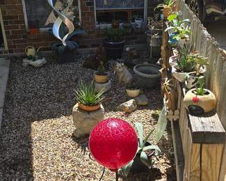 Lots of plants, pots, planters and outdoor decor