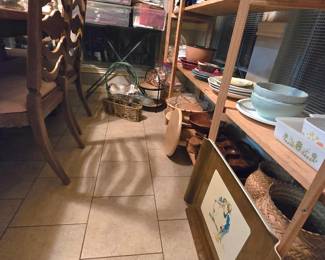 large selection of decorative dishes, baskets, wood trays, linens, home decor, etc