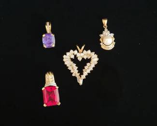 Gold diamonds and pearl, tanzanite diam,synthetic ruby and diam pendants