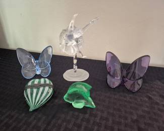 Baccarat butterflies, Lalique fish, Murano heart box, Swarovski ballerina 