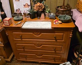 Beautiful chest of drawers with marble slab.