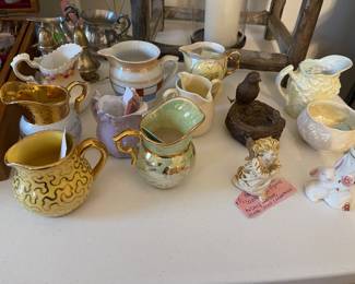 Antique Pitchers and creamers