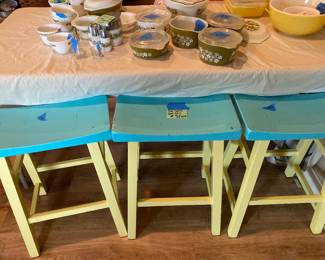 Three painted saddle stools- counter height 