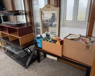 mirror, tables and trays, cleaning supplies, light bulbs